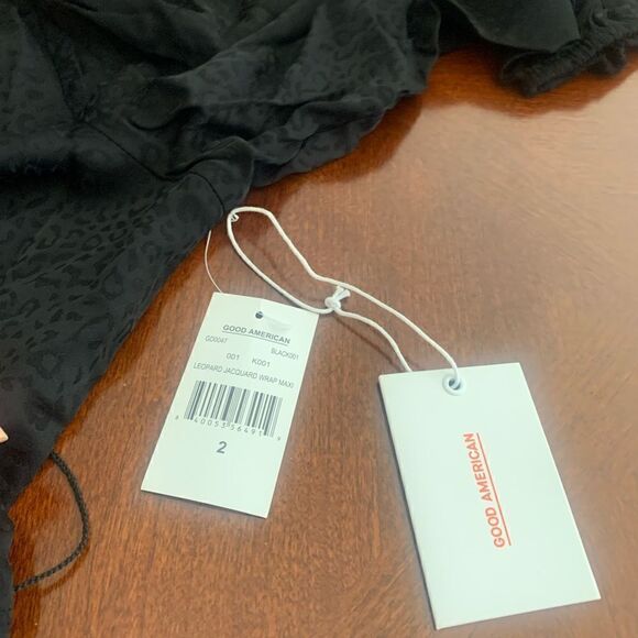 Good American cheetah print 3/4 puff sleeve wrap dress size Medium, NWT - Picture 7 of 9